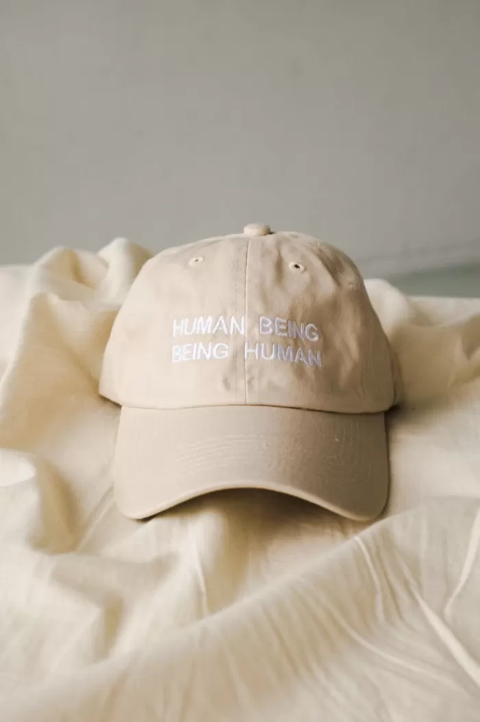 Hats & Scarves | INTENTIONALLY BLANK Human Being Hat Sand Hat/White Writing