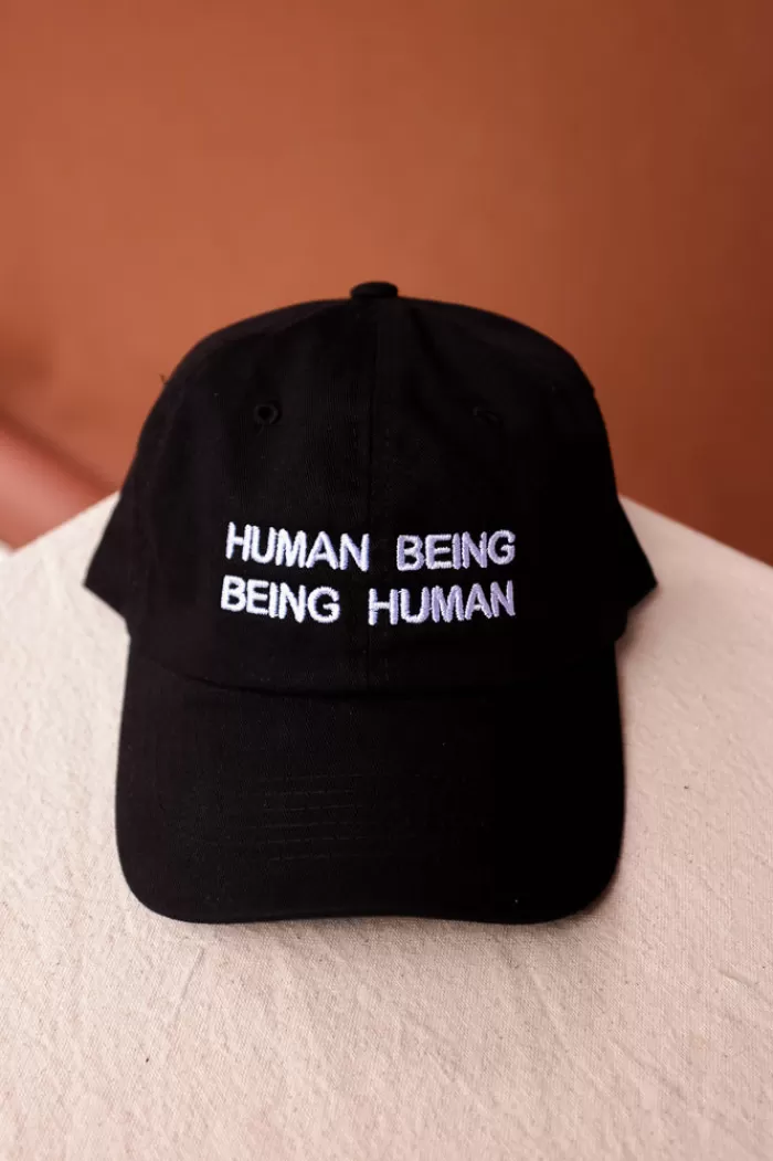 Hats & Scarves | INTENTIONALLY BLANK Human Being Hat Black Hat/White Writing